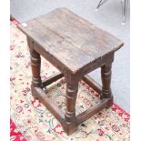 An oak joint stool.