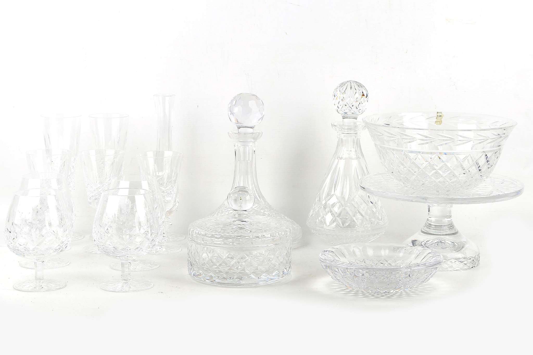 An extensive suite of Waterford cut glass crystal stemware, some boxed, including 12 brandy glasses,