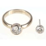 A diamond single-stone ring and a single diamond earstud, 1st: Ring collet-set with a cushion-shaped