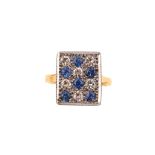 A sapphire and diamond plaque ring The rectangular millegrain plaque pavé-set with brilliant-cut