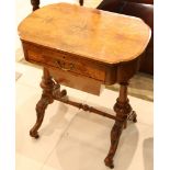 A late Victorian, marquetry inlaid walnut writing work table, the hinged top enclosing a leather