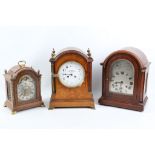 An early 20th Century, mahogany cased mantel clock with silvered dial, an inlaid mantel clock