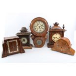 An early 20th Century American drop dial wall timepiece, an Ansonia mantel clock and a similar