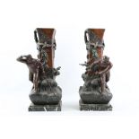 A pair of cold painted spelter garniture vases cast with mariners and gulls, 50cm high.