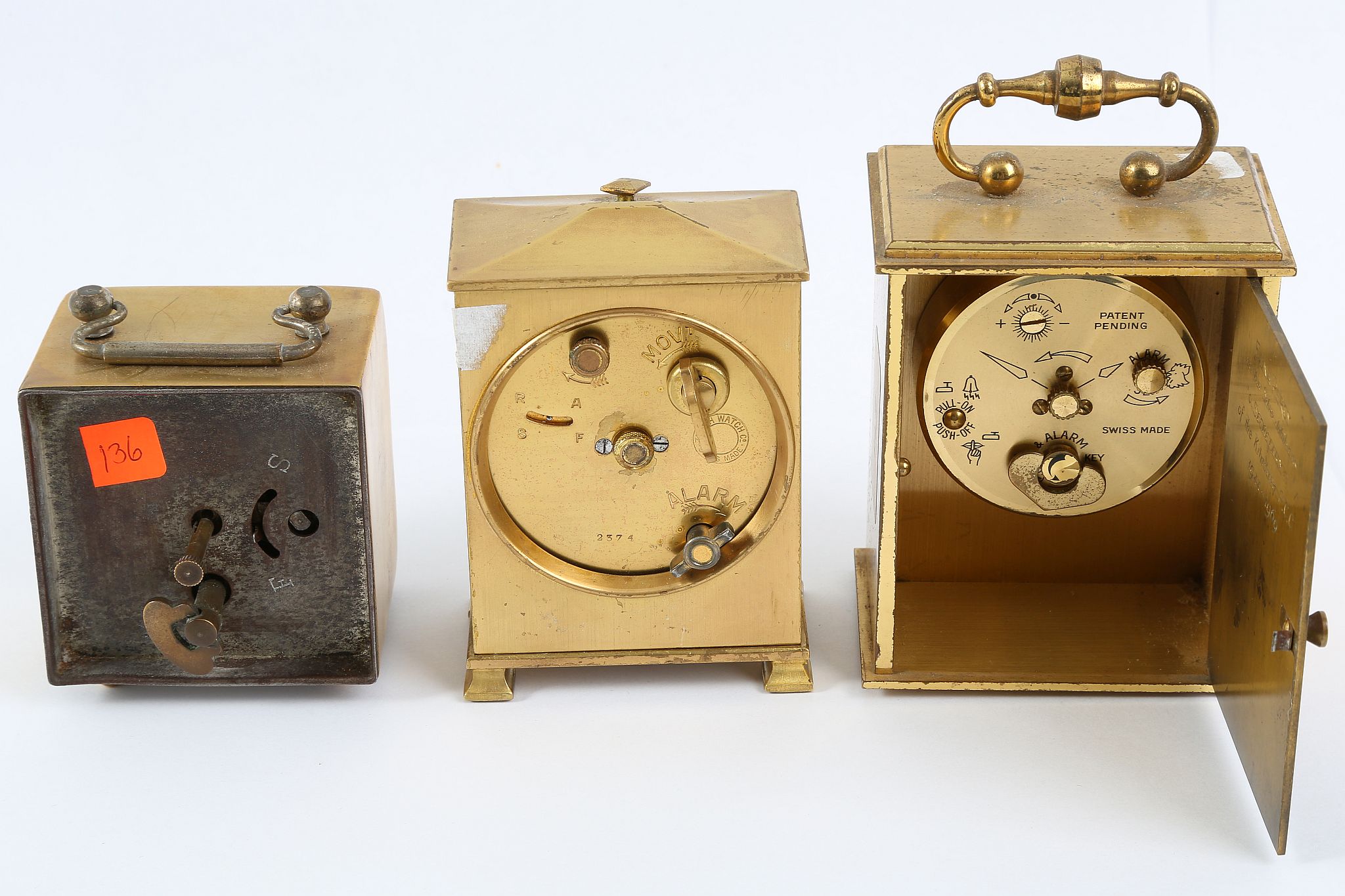 A Zenith Watch Company, gilt brass bedside alarm timepiece and two other brass timepieces. - Image 2 of 2