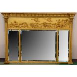 A regency giltwood and gesso over-mantel mirror, the ball frieze over a classical chariot tablet and