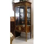 A Louis XVI design, gilt metal mounted kingwood vitrine with variegated red marble top, the glazed