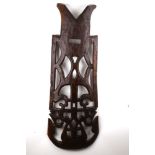 A HARDWOOD BIRTHING CHAIR, MALAWI Composed of two separate pieces, the high openwork back carved