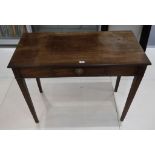 A 19th Century side table with single drawer, supported on square tapered legs, and a 19th Century