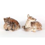 A Royal Copenhagen figural group of fox and cubs, model no.1788, designer HF, sold with a model of a