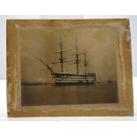 HMS VICTORY - PHOTOGRAPH.  An early monochrome photograph of the ship in water, [c.1880?]. Pasted