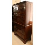 A George III mahogany chest on chest, fitted with two short over six graduated long drawers on