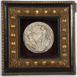 A decorative marble roundel after E.W. Wyon. Presented in an ebonised and gilt frame, glazed. 44 x