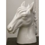 A white porcelain sculpture of a stallion's head, by Vellum, Italy.