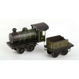 Bing O Gauge clockwork locomotive and tender, green livery 3410, tender GB, c.1920.