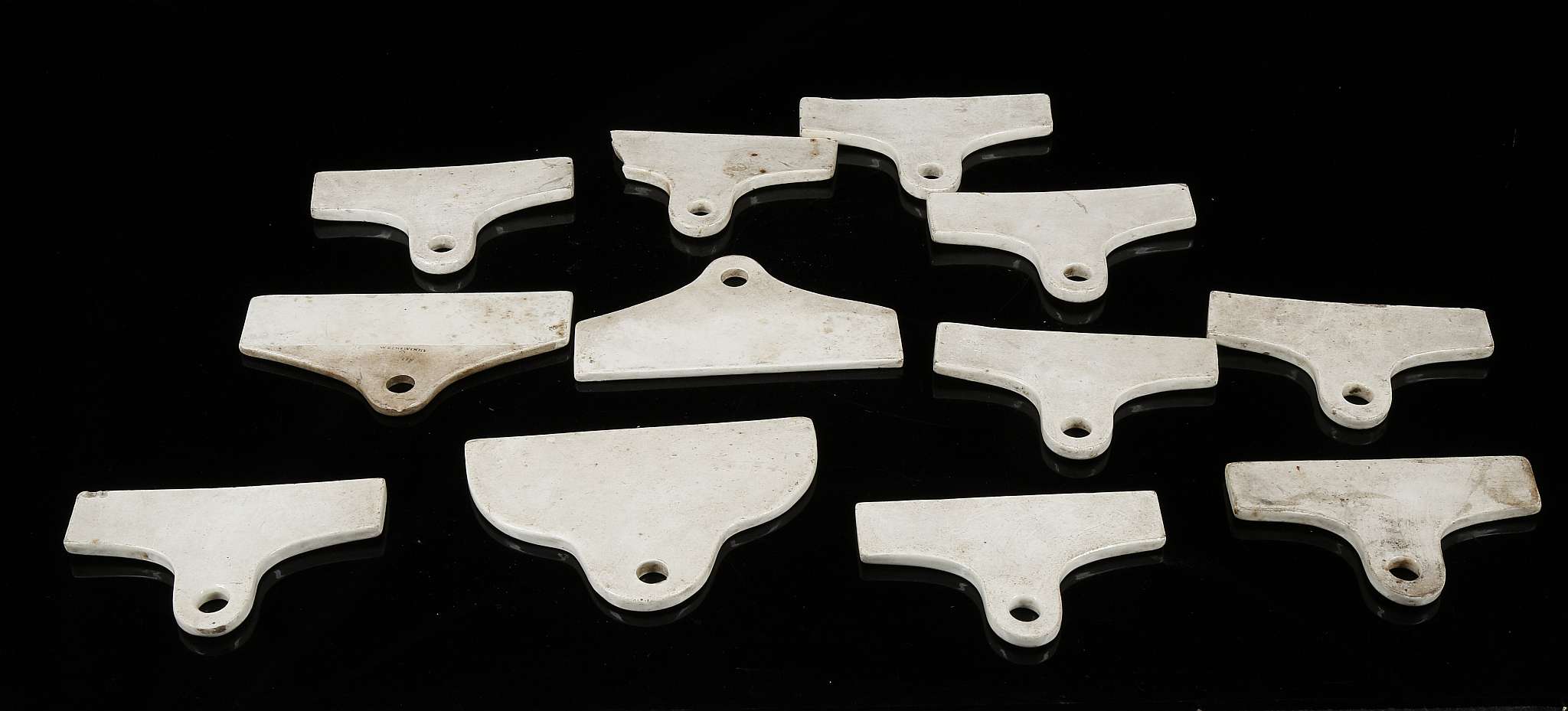 A COLLECTION OF TWELVE WEDGWOOD WHITE BIN END LABELS, early 19th century, all of typical coat-hanger - Image 6 of 6