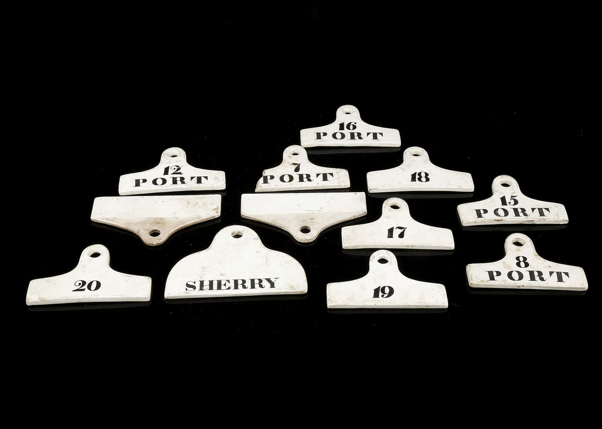 A COLLECTION OF TWELVE WEDGWOOD WHITE BIN END LABELS, early 19th century, all of typical coat-hanger