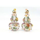 A PAIR OF MEISSEN PORCELAIN SCENT BOTTLES AND STOPPERS, late 19th century, both of double-gourd form