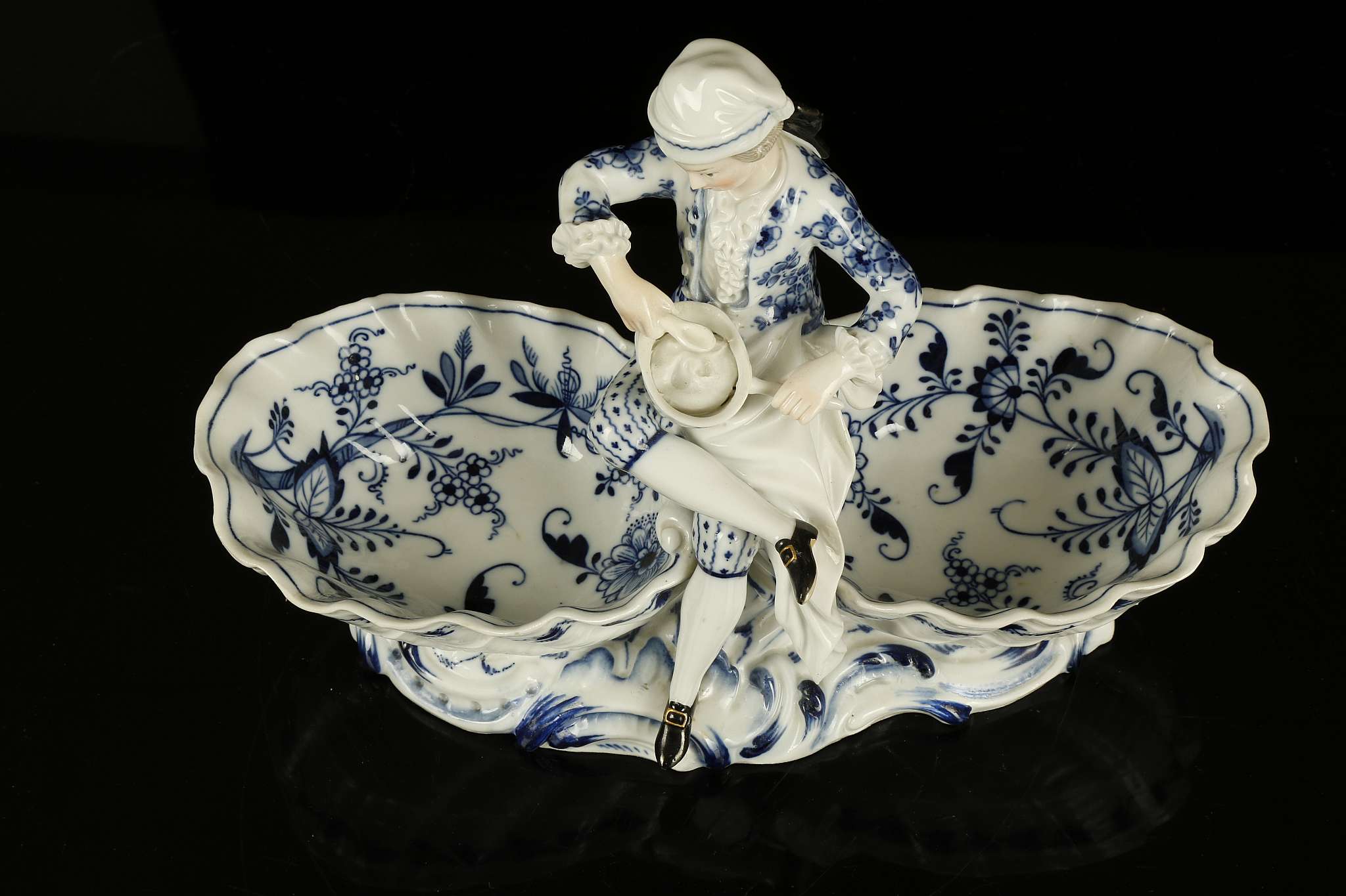 A MEISSEN PORCELAIN FIGURAL SWEETMEAT DISH, late 19th century, modelled as a young cook wearing a - Image 2 of 4