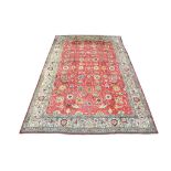 A SIGNED TABRIZ CARPET NORTH-WEST PERSIA, CIRCA 1940 approx: 13ft.6in. x 9ft.1in.(412cm. x 276cm.)