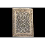 A FINE KASHAN CARPET CENTRAL PERSIA, CIRCA 1950 approx: 13ft.7in. x 9ft.1in.(414cm. x 302cm.)