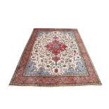 A FINE TABRIZ CARPET NORTH-WEST PERSIA, CIRCA.1940 SIGNATURE JAVAN AMIR KHIS approx: 13ft.1in. x