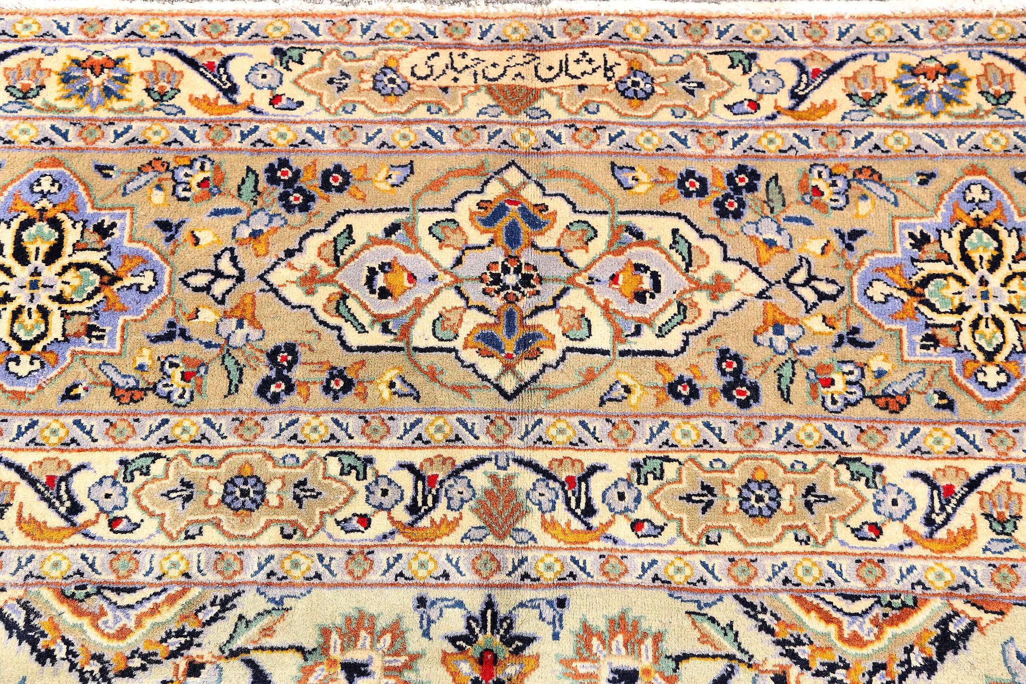 A FINE SIGNED KASHAN CARPET CENTRAL PERSIA, CIRCA 1950 approx: 12ft.2in. x 9ft.2in.(370cm. x 279cm.) - Image 4 of 5