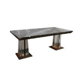 A 1960s ITALIAN DINING TABLE, with black marble top, having brass stepped edge, on twin perspex