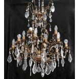 A MID 20th CENTURY FRENCH CHANDELIER, with clear, blue and amber glass drops, on gilt mount (70cm