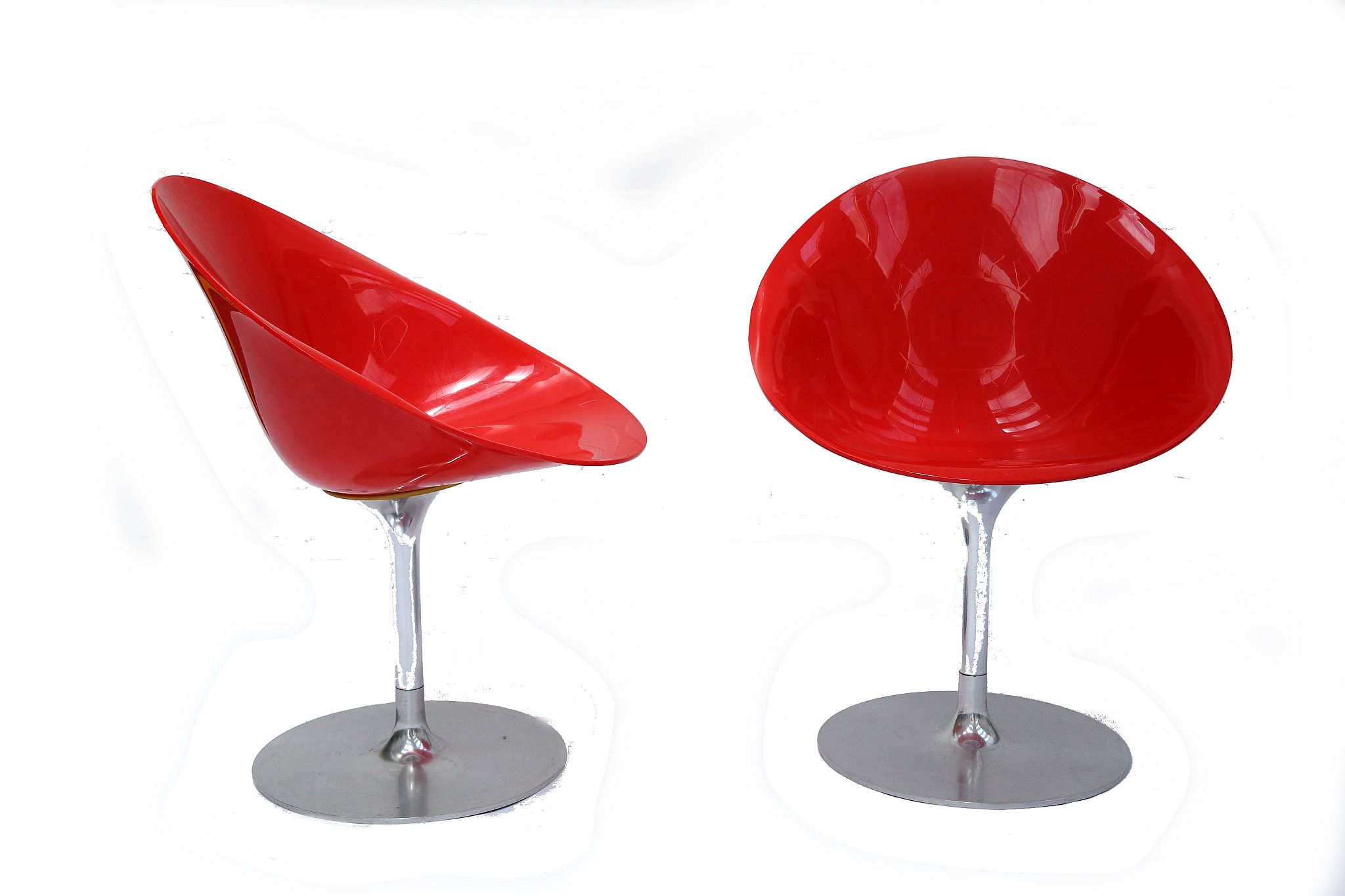 A PAIR OF EROS CHAIRS, DESIGNED BY PHILIPPE STARCK, MANUFACTURED BY KARTELL, red polycarbonate seats