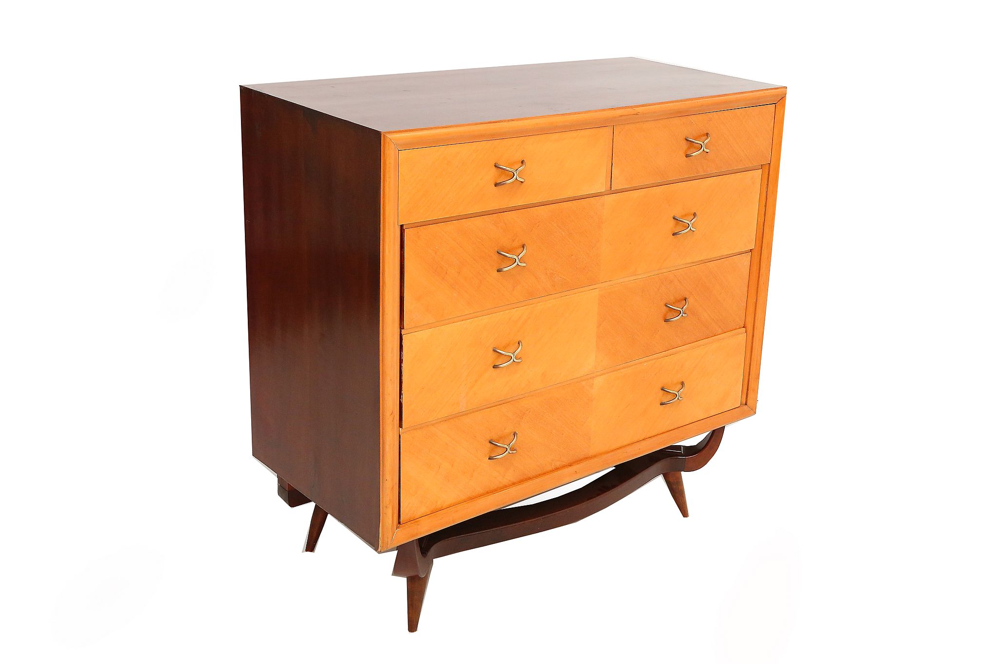 A 1950s CHEST OF DRAWERS, DESIGNED BY JOSE BERENFELD, in contrasting light and dark wood, with