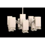 A 1960s ITALIAN NINE LIGHT CHANDELIER, MANUFACTURED BY SCIOLARI, in brushed aluminium with clear