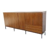 A LARGE 1960S ROSEWOOD SIDEBOARD, with two full length double cupboards, and double cupboard over