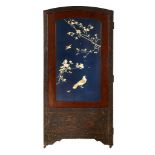A LARGE INLAID TWO PANEL SCREEN. Meiji period. Each panel decorated in high relief, in ivory, bone