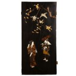 A WOOD INLAID PANEL. Meiji period. Depicting two women under a flowering cherry tree, inlaid in