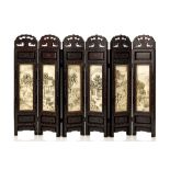 A CHINESE SIX PANEL WOOD SCREEN WITH IVORY PANELS.. Early 20th Century. Each ivory panel deeply