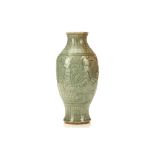A CHINESE LONGQUAN CELADON VASE. Ming Dynasty. Decorated with incised floral patterns, 42cm H. (2) 明