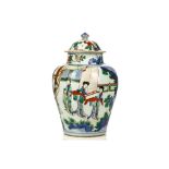 A CHINESE WUCAI 'LADIES' JAR. Transitional era. Decorated with ladies and attendants on a veranda,