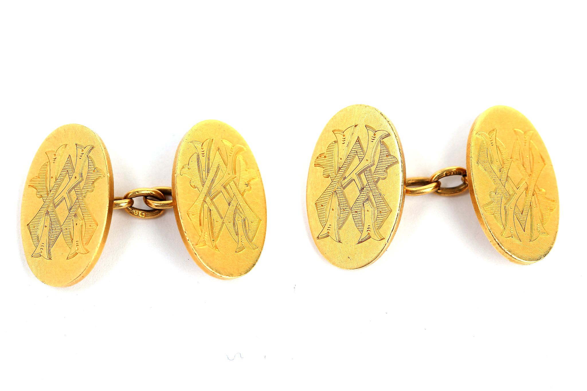 A pair of gold cufflinks, 1911, Double-sided: each 18 carat yellow gold terminal engraved with a