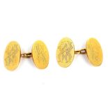 A pair of gold cufflinks, 1911, Double-sided: each 18 carat yellow gold terminal engraved with a