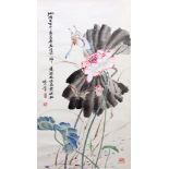 A Chinese ink painting of butterflies and lotus flowers. Mounted as a hanging scroll. 64 x 33cm.
