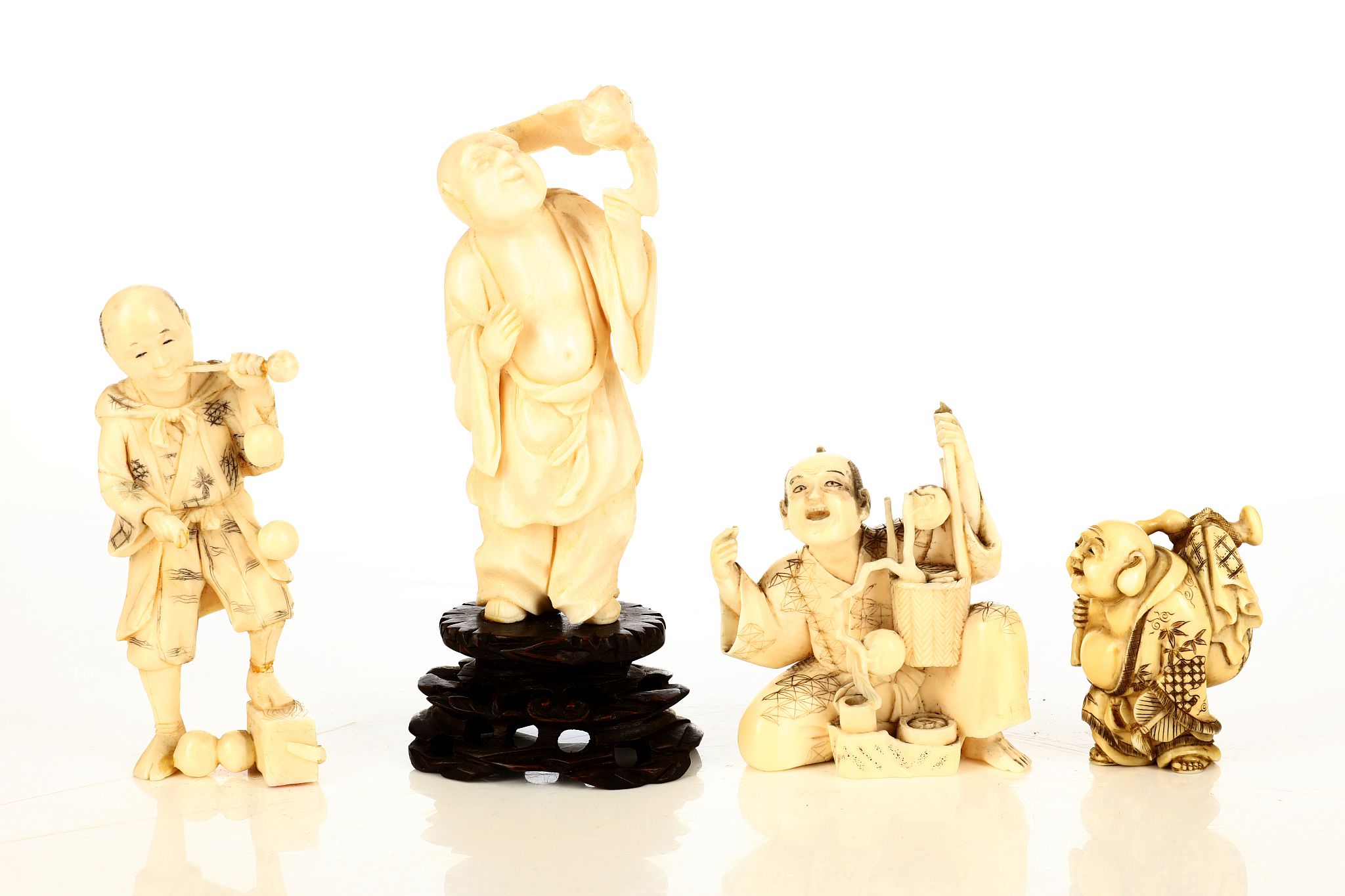 Four Japanese ivory okimono carvings. Meiji period. Depicting Hotei, and farmers. (4)