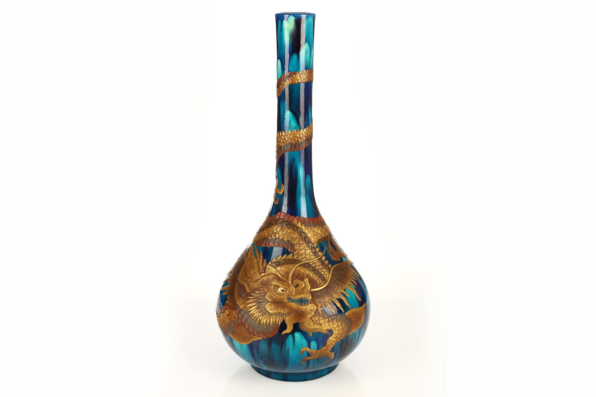 A Japanese turquoise ground dragon vase. Early 20th Century. The vase of pear shaped form with a