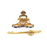 An enamel and diamond regimental brooch and a milestone bar brooch (2)