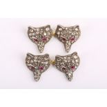 A pair of antique fox head cufflinks, pavé set with rose cut diamonds and ruby eyes. Unmarked yellow
