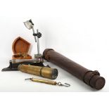 A Victorian two draw telescope, a leather telescope case, a Rabone spirit level, a brass scale and