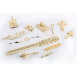 A collection of 19th century carved ivory items to include sewing related items such clamps bodkin