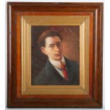 A framed oil painting portrait of WWI poet Issac Rosenberg (b.1890-d.1918 Somme, France), 24cm x