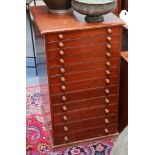 Early 20th stained pine collectors chest fitted 12 graduated drawers on plinth foot 91 cms H 53