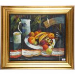 An oil painting still life of fruit and ceramic ware on a table setting, 47cm x 57cm.